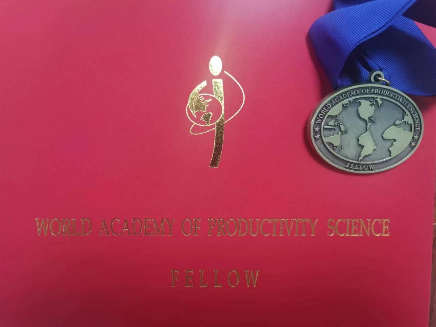 橡胶研究知名专家王明江教授授予“世界生产力科学院”院士